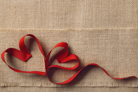 Two Hearts, Sackcloth Burlap Background. Valentine Day, Wedding Love Concept