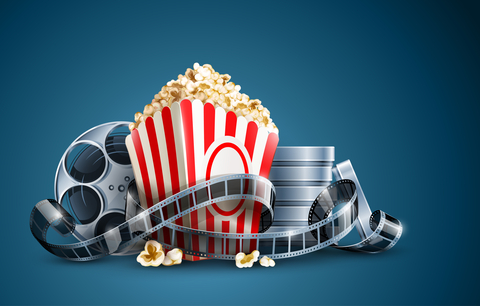 Movie film reel and popcorn