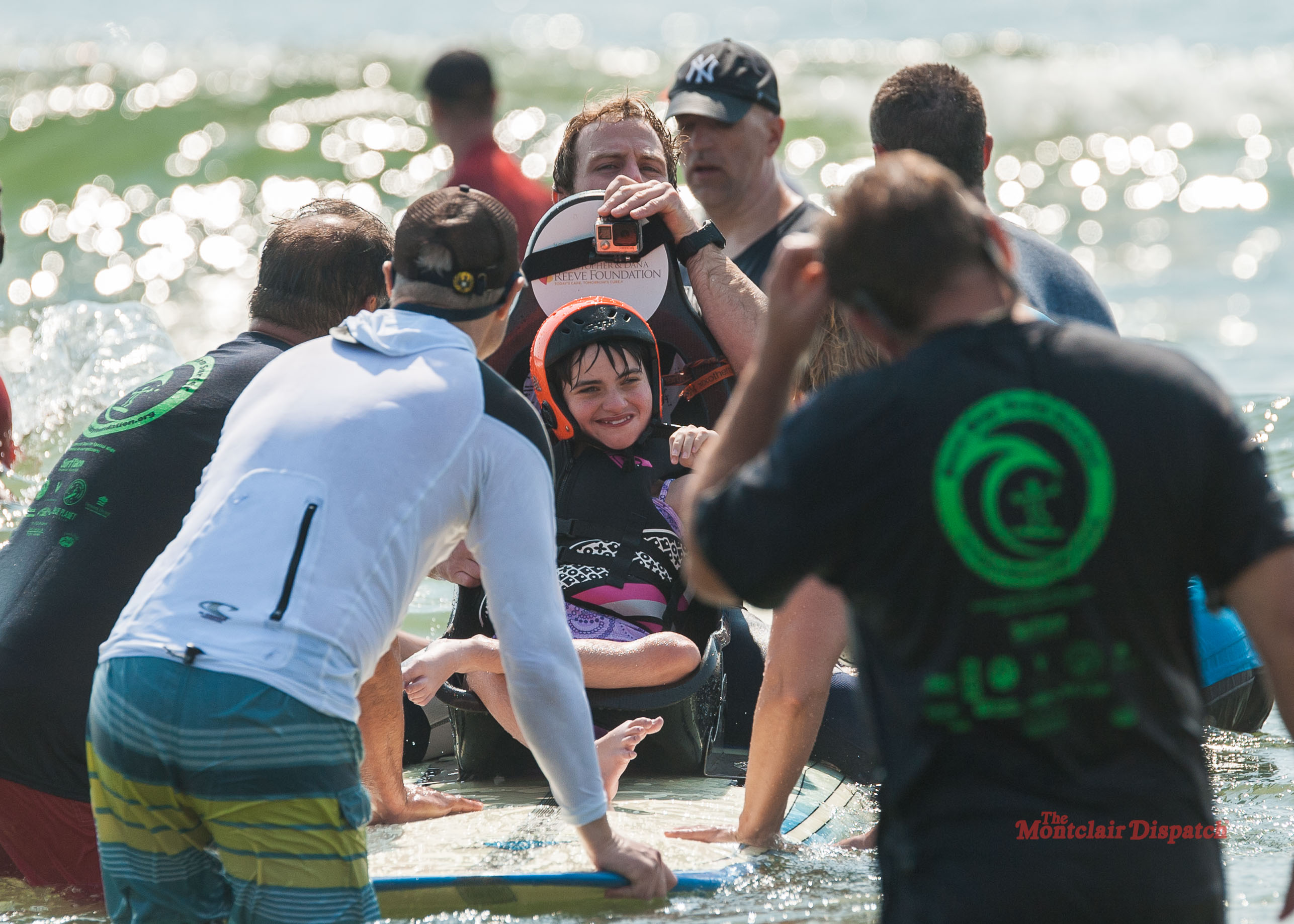 A participant happy after their turn surfing. Photo by Scott Kennedy for The Montclair Dispatch.